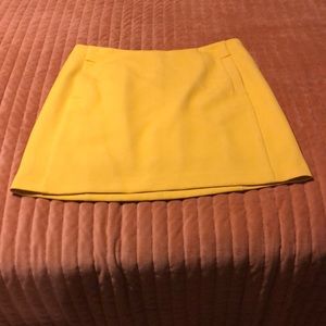 Yellow mini skirt by Banana Republic.
